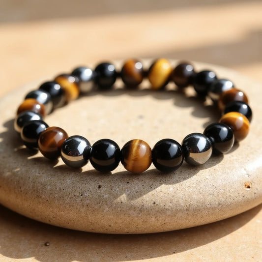 Caryra | Pulsera "3 Protecciones" en Ojo de Tigre, Hematites y Obsidiana Negra